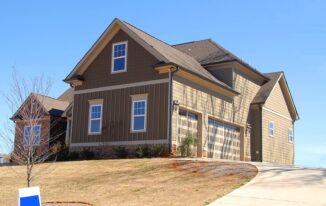 Brown and Beige Wooden House Under Blue Sky